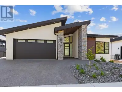 This stunning 4,900 sq. ft. home offers three distinct living spaces, perfect for multi-generational...