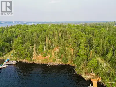 Incredible opportunity to own a piece of sought-after Coney Island on beautiful Lake of the Woods! T...