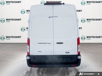 Introducing the 2026 Ford Transit Cargo Van, a powerhouse wrapped in a pristine White exterior and e... (image 4)
