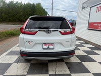 A practical compact SUV with a spacious interior, efficient performance, and modern safety features,... (image 4)