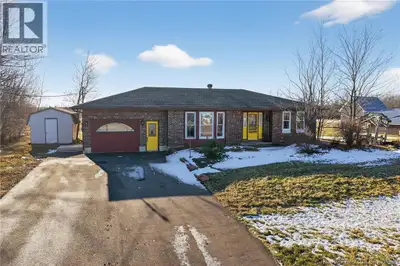 Welcome to 301 Trois-Ruisseaux Road in Cap-Pele. A charming bungalow nestled in a peaceful country s...