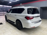Experience luxury and power with the stunning 2024 INFINITI QX80 LUXE, presented in a sophisticated... (image 1)