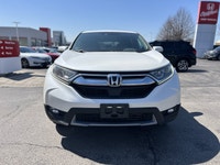 Designed for discerning drivers seeking both comfort and capability, this pristine 2017 Honda CR-V E... (image 2)
