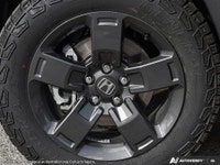 Introducing the 2026 Honda Ridgeline TrailSport AWD, a striking new truck that's unmissable in its b... (image 6)