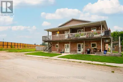 **Stunning Fourplex Opportunity!** Built in 2009, this meticulously maintained fourplex offers four...