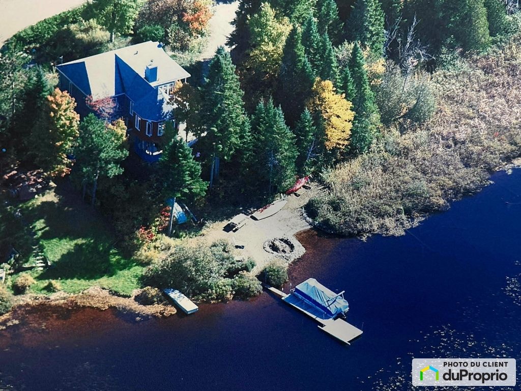 $799,000 - Cottage for sale in St-Donat — photo 1
