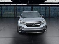The 2021 Honda Pilot Touring 8-Passenger AWD in Silver is an exceptional choice for those seeking a... (image 2)