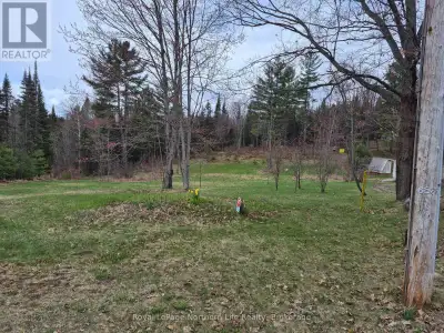 Perfect gateway location to build your dream home. This landscaped parklike property with lawns and...