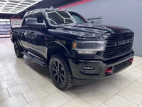 The 2019 Ram 2500 Laramie, with its bold black exterior and sophisticated 4x4 drive, promises except... (image 5)