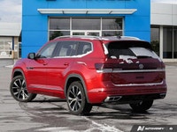 Experience sophisticated style and robust performance with this striking red 2024 Volkswagen Atlas E... (image 3)