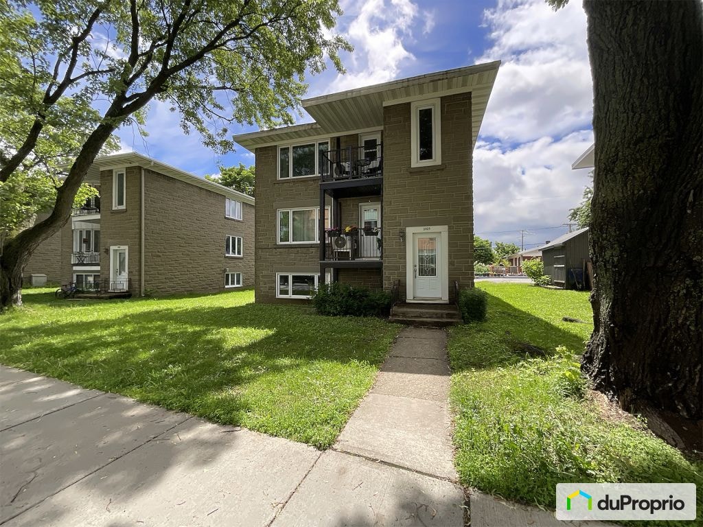 $998,000 - Triplex for sale in Ste-Foy — photo 1