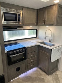 East to West Alta with bunkroom! This trailer features 2 slides, one in the main living area and ano... (image 8)