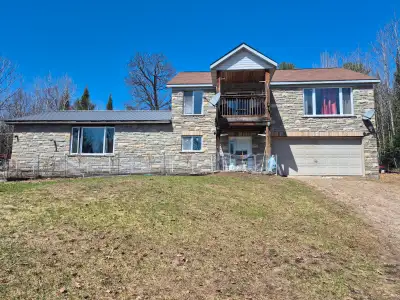 1-acre private country home. 2 plus 1 bedroom. 1.5 story. Stone and siding. Attached 2 car insulated...
