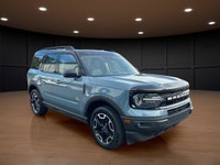 The 2021 Ford Bronco Sport Outer Banks in a striking blue finish with its capable 4x4 drivetrain off... (image 3)