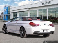 Experience the thrill of open-air driving in this stunning 2018 BMW 6 Series 650i xDrive Convertible... (image 2)