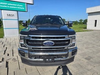 2020 Ford F-250 Super Duty Lariat 4WD Crew Cab equipped with the 6.7L Power Stroke Diesel and 201,00... (image 1)