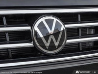 This Volkswagen Tiguan delivers a Intercooled Turbo Regular Unleaded I-4 2.0 L/121 engine powering t... (image 9)