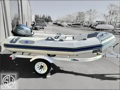 2004 West Marine Inflatable Inflatable Equipped with: Cover TrailerTrailer included 15hp Yamaha outb...