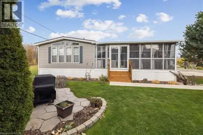 Welcome to 4449 Milburough Line #13 Spruce in beautiful rural Burlington! This charming and well-mai...
