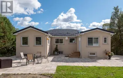 Impressive Renovated Bungalow 2 Bed (Originally 3) Just Minutes from the City! This beautifully upda...