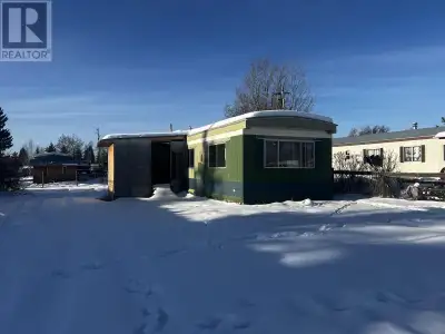 * PREC - Personal Real Estate Corporation. Embrace the potential of this 2-bedroom, 1-bath trailer l...