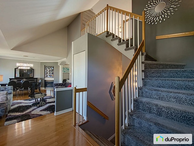 $689,900 - Penthouse for sale in Dollard-Des-Ormeaux — photo 1