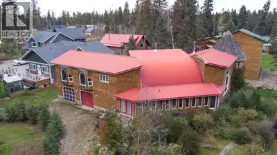 Nestled in the serene enclave of Powm Beach on Turtle Lake, this custom-built masterpiece spanning o...