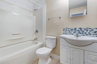 Amenities: Affordable Parking • Fireplace • Walk-In Closets Suite & Building: Spacious bachelor, one... (image 6)