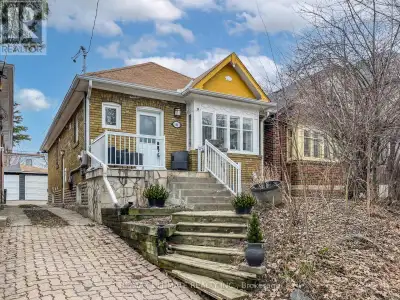 Welcome to this beautifully renovated two-bedroom bungalow, where timeless character blends seamless...