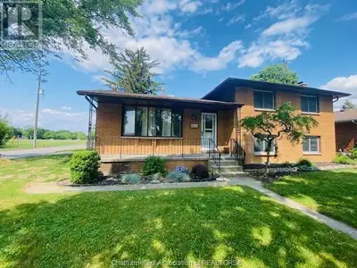 CENTRALLY LOCATED, WELL MAINTAINED ALL BRICK OVER SIZED 4 LEVEL SIDESPLIT, HARDWOOD FLOORS THROUGHOU...