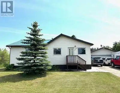 Goodsoil, SK bungalow with super size garage on two lots! This 1945 bungalow has seen a new bathroom...