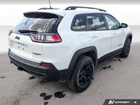 Experience rugged capability and everyday comfort with the *2022 Jeep Cherokee Trailhawk*, featuring... (image 5)