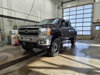 Welcome to Sherwood Buick GMC! Aftermarket 6 Rough Country Lift Kit/Fender Flares/S&B Intake/Headach... (image 3)