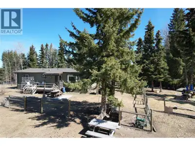 Set on 10 private acres in Lone Butte, this beautifully updated 2-bedroom rancher offers modern comf...