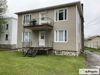 Duplex de deux grands 51/2 biens éclairés au cur du centre-ville avec tous les services à proximité...