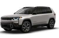 The 2026 Jeep Cherokee Overland, presented in a sleek gray shade and equipped with a robust 4x4 driv... (image 5)