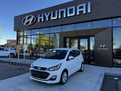 The 2021 Chevrolet Spark 1LT is a compact hatchback designed with city driving in mind. As a mid-lev...