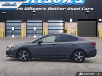 Come see this certified 2021 Subaru Impreza Touring AWD | 5-Speed Manual | Heated Seats | Alloy Whee... (image 1)
