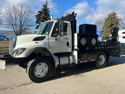 This truck is in great condition overall. It comes complete with 13FT Steel Service Body/Flatbed wit...