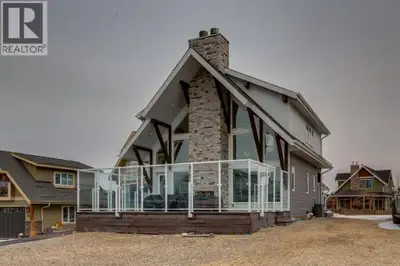 Modern architecture meets effortless lake living in this beautifully designed open-concept home. Soa...