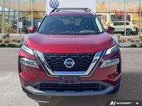 Experience enhanced visibility and an open-air feel in this stunning red 2021 Nissan Rogue SV, featu... (image 7)