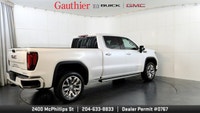 The 2024 GMC Sierra 1500 Denali is a full-size luxury pickup truck that combines rugged capability w... (image 2)