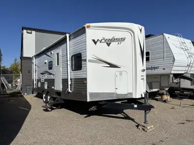 Used family bunk model trailer! The front bedroom features the highly sought after walk around bed a...
