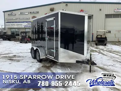 6X12 Enclosed Cargo Trailer located in Nisku, Alberta. 6X12 V-Nose Tandem Axle Standard 72in. Interi...