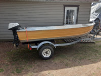 Aluminum boat motor and trailer