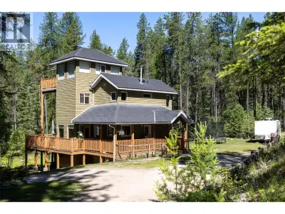 Rosen Lake Gem! This beautiful 4 bedroom, 2 bathroom home is tucked away on 2.5 acres. Sip your morn...