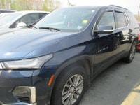 Finished in blue with a black interior, this used 2023 Chevrolet Traverse LT Cloth is a roomy midsiz... (image 1)