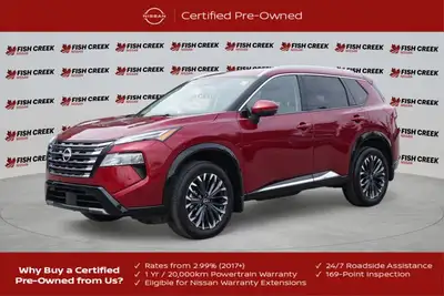 The 2025 Nissan Rogue Platinum, in striking Red, offers a sophisticated driving experience with only...