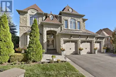 Curb Appeal & 121 feet of Frontage! Pride of Ownership is evident throughout this impressive nearly...