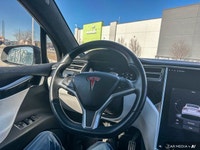 The 2017 Tesla Model X includes a power liftgate, heated front seats, and a navigation system. It of... (image 8)